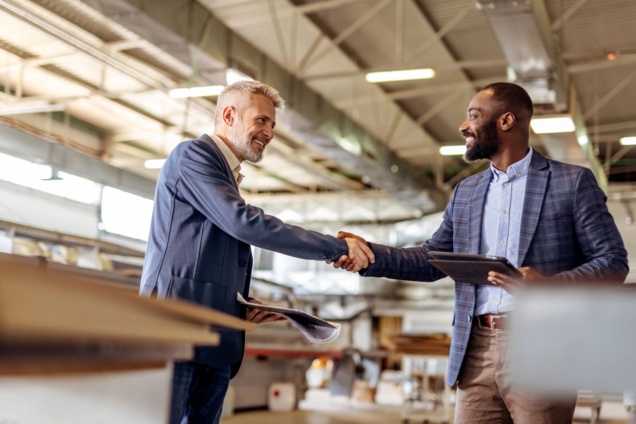 business handshake industrial supply partnership